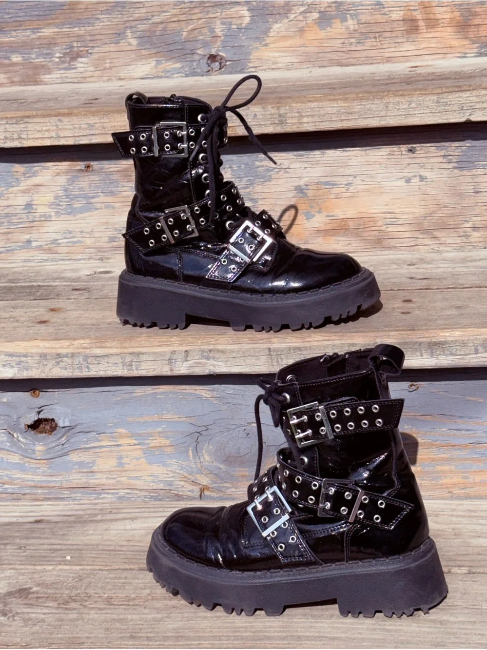 Zara black patent leather buckle combat moto boots, featuring a glossy finish 34